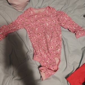 Multiple toddler bodysuits